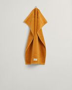 Premium towel 50x70, golden yellow
