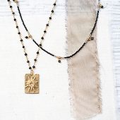 Cocoon black onyx gold necklace