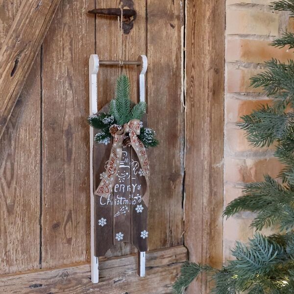 Vintage sledge for deco with spruce & ribbon
